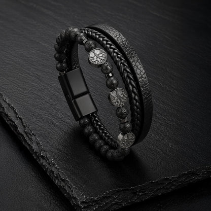 Schwarzes Herren Lederarmband mit Lavasteinperlen und Lebensbaum Anhängern.